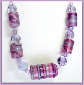 Purple Barrel Beads with liquid clay swirls